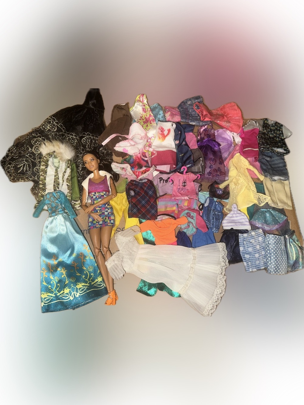 Barbie Doll & Assorted Clothing lot